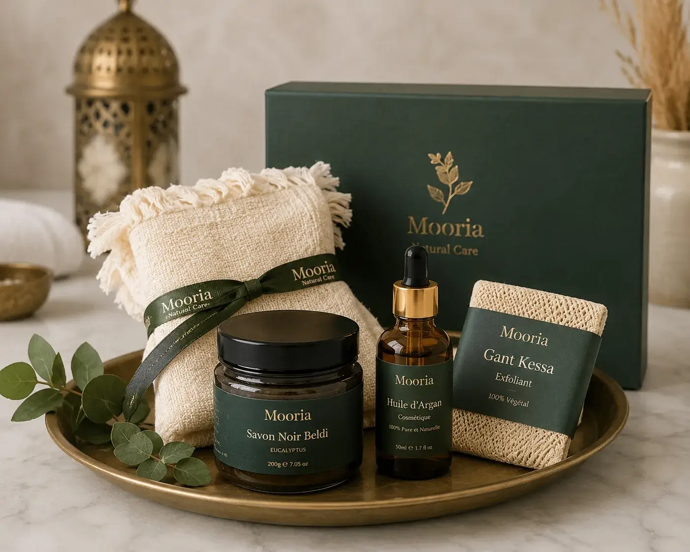 Hammam gift set with black soap and argan oil on tray, clean